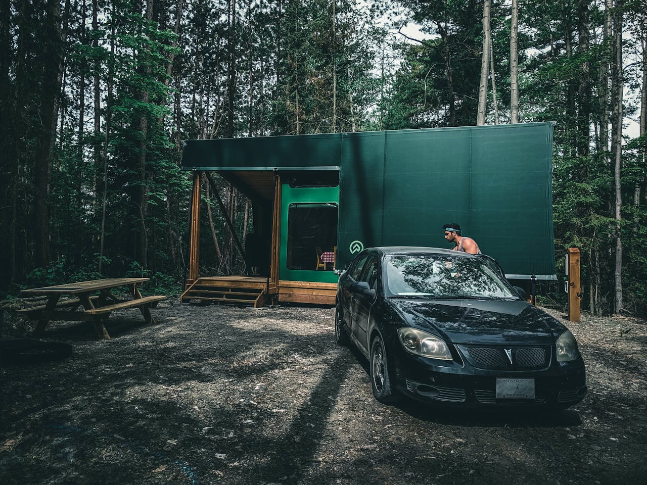 Explore a modern cabin nestled in Quebec's serene forest, perfect for travel adventures.